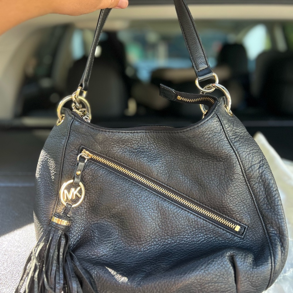 Michael Kors Black Hobo Bag with Gold Accents